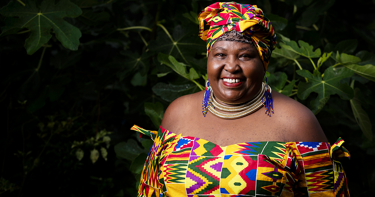 Rosemary, who came to Australia as a refugee from Kenya, poses for a photo at her home in Western Sydney. @UNHCR/Brook Mitchell