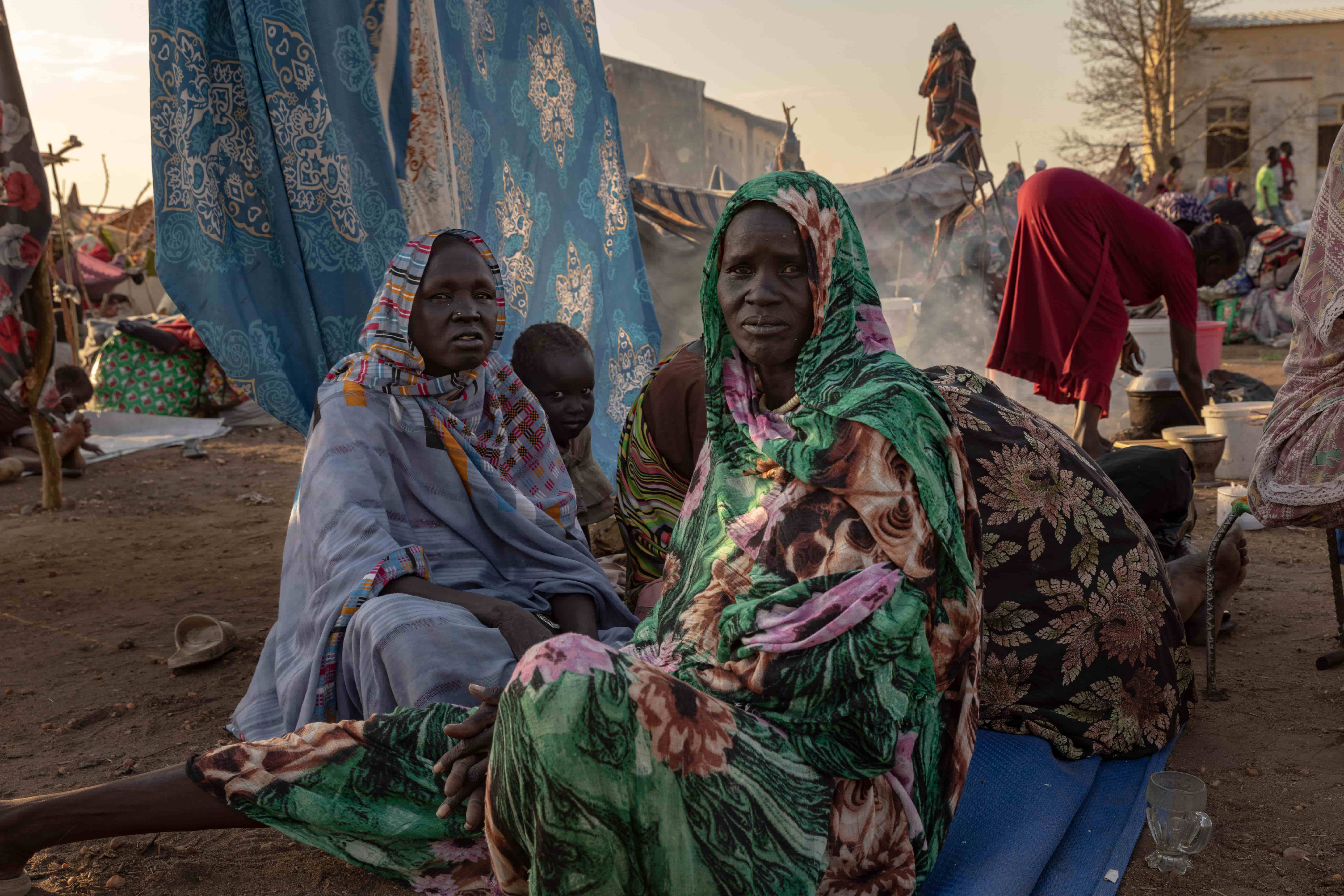 Panam and Agoth outside the Renk transit centre in South Sudan