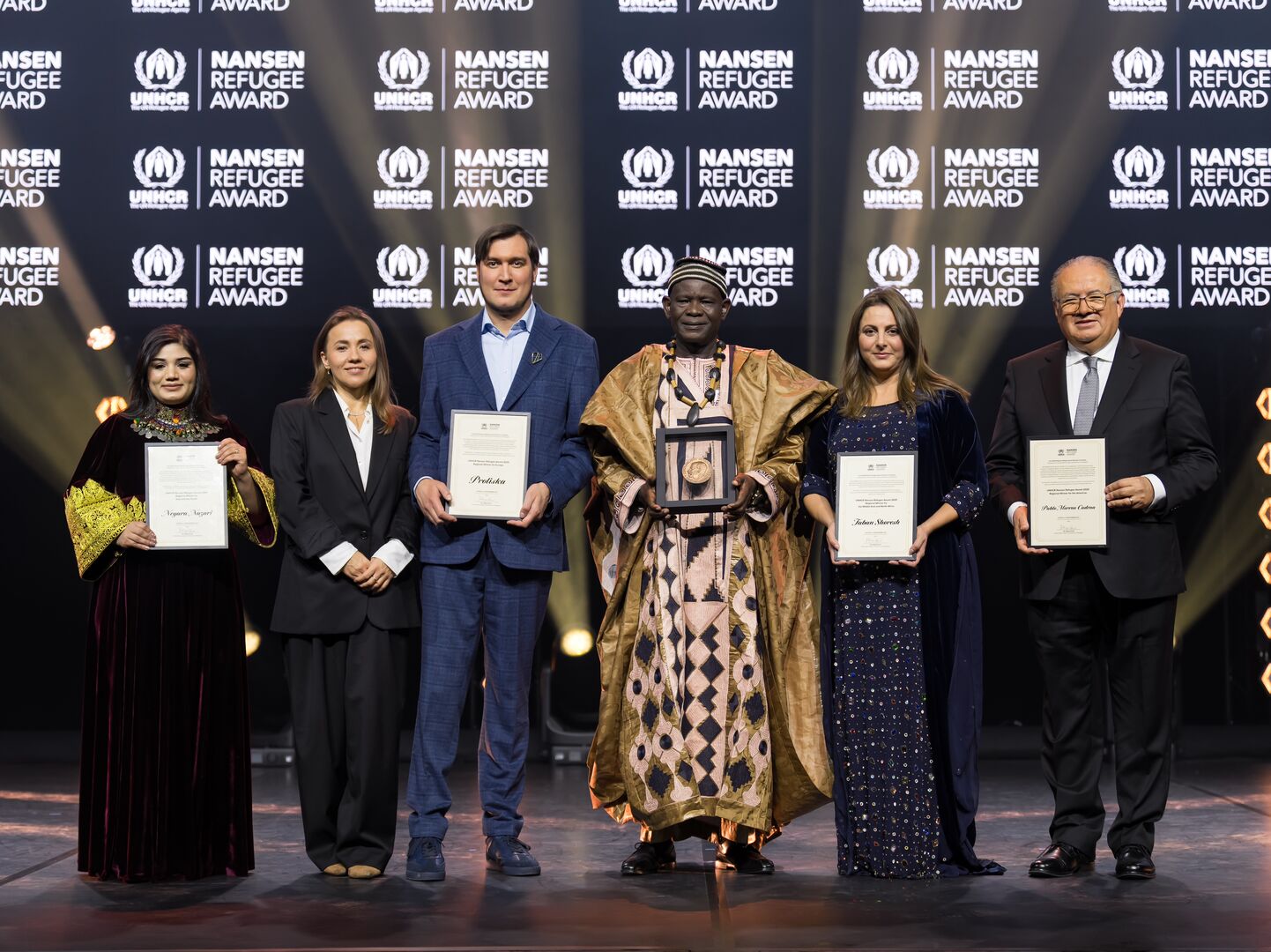 The 2025 winners of the UNHCR Nansen Refugee Awards attend the ceremony in Switzerland.