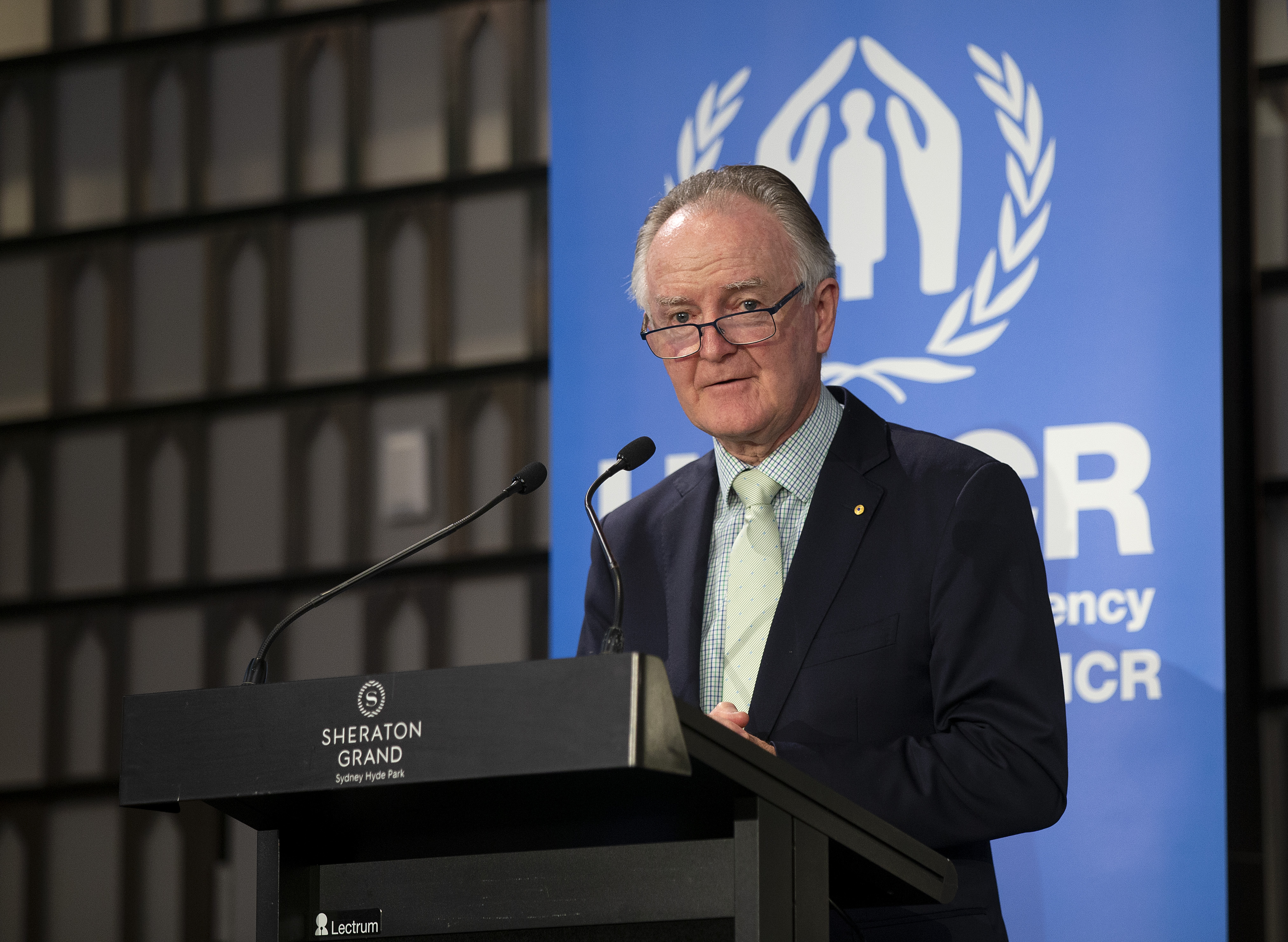 Michael Dwyer speaking at World Refugee Day event